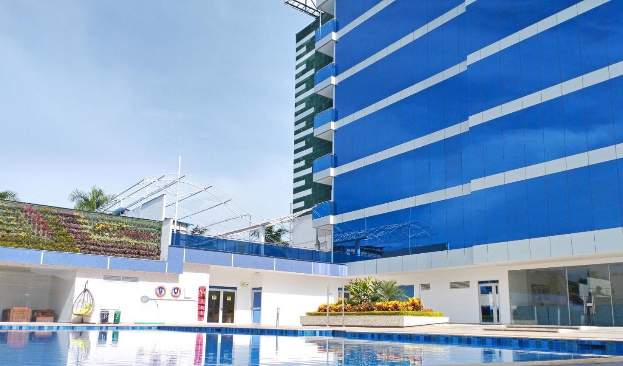 Hotel Royal Elim Internacional Cali Exterior foto The pool at the hotel
