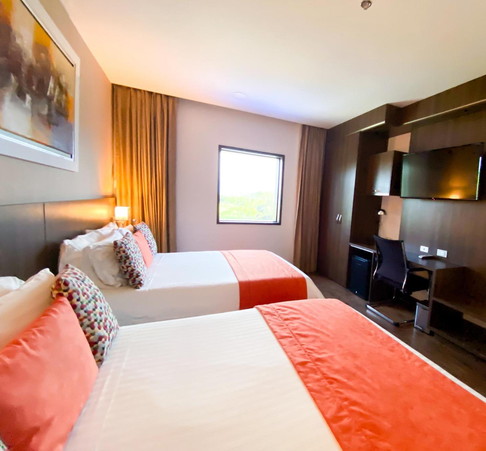 Hotel Royal Elim Internacional Cali Exterior foto A room at the hotel