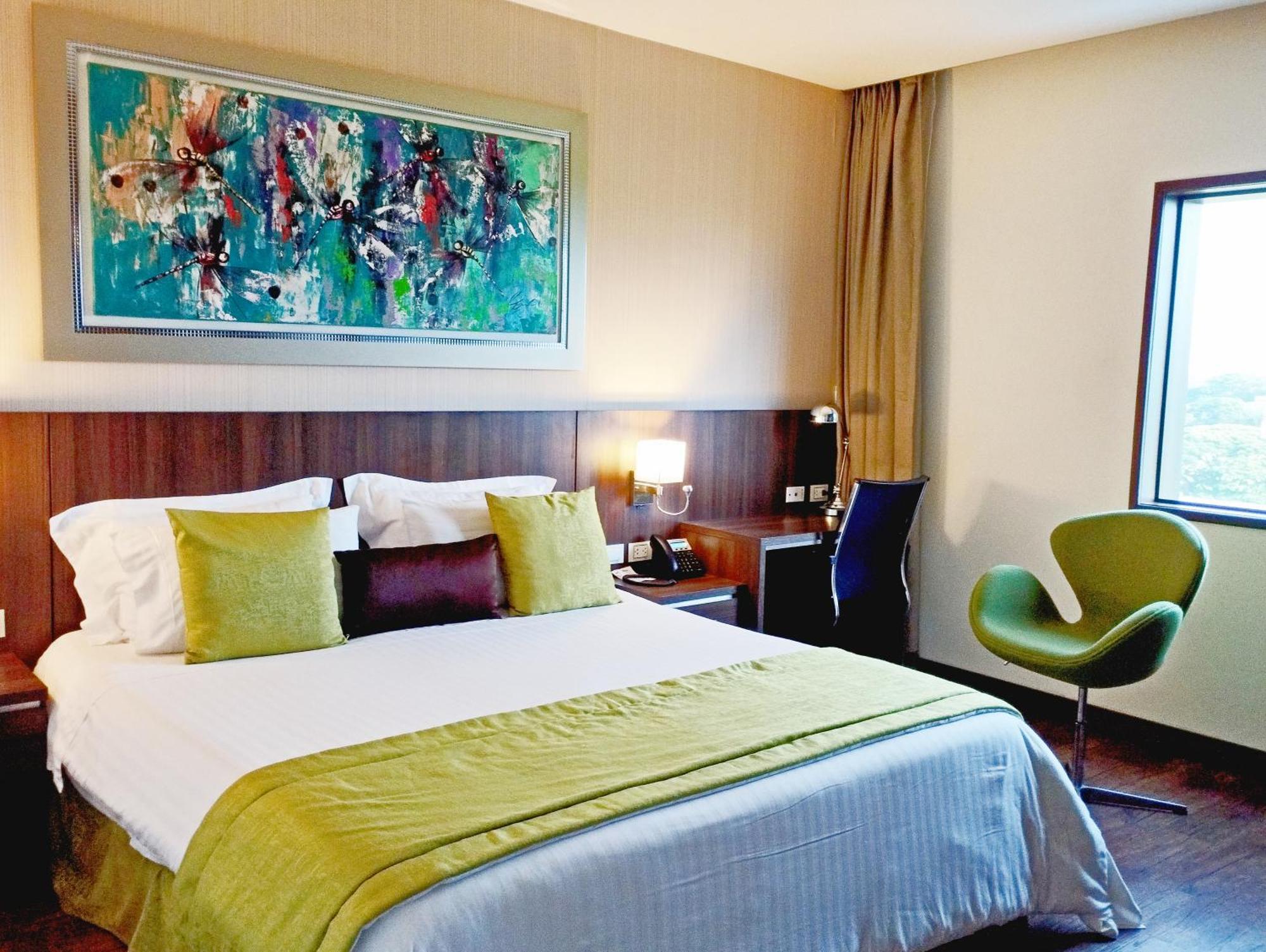 Hotel Royal Elim Internacional Cali Exterior foto A room at the hotel